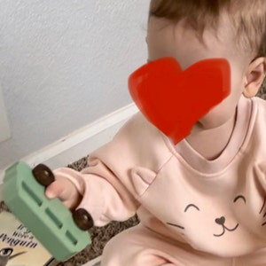 Rashad added a photo of their purchase