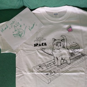 Cats on Synthesizers in Space Is the Right Kind of Weird