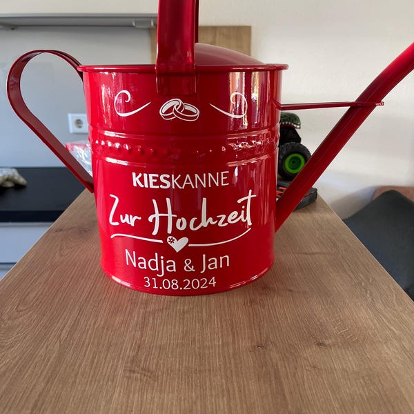 Geldgeschenk „Kieskanne“ zur Hochzeit Lila 10l / personalisierte