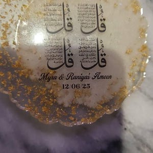 Aisha added a photo of their purchase