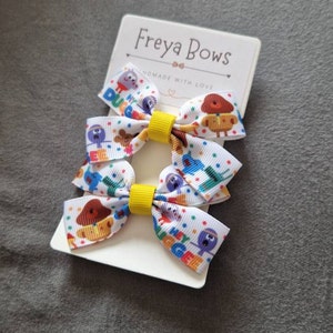 Babyhug Bow & Butterfly Clips with Fur and Floral Applique Pack of 6 - Sky Blue Pink and Yellow