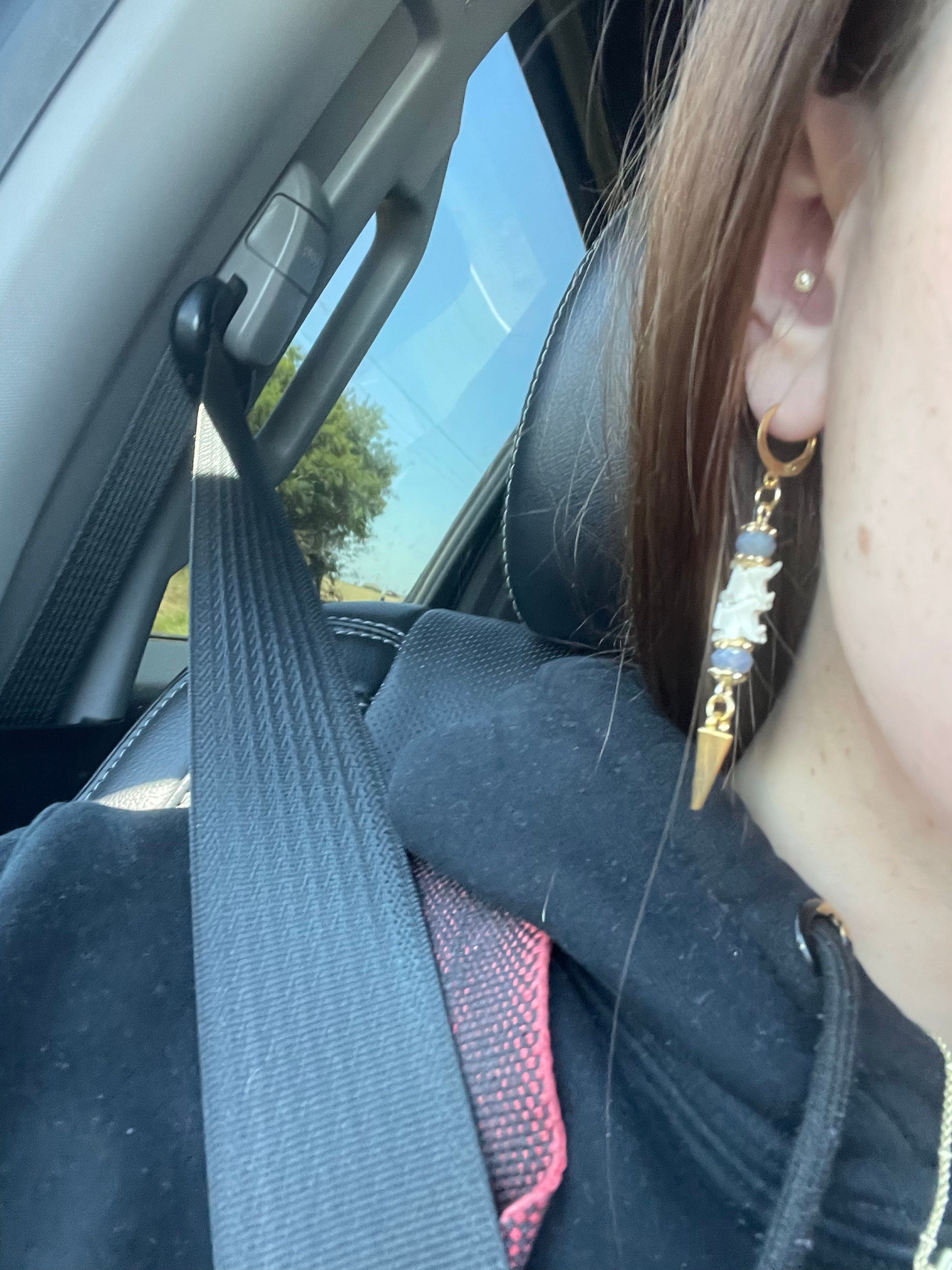 Exquisite Victorian-Era Inspired Coiled Rattlesnake Vertebrae Dangling, Earrings with Intricate Metalwork and Antique Brass Finish