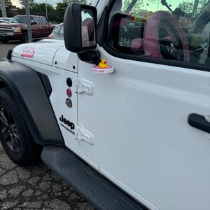 Sarah added a photo of their purchase