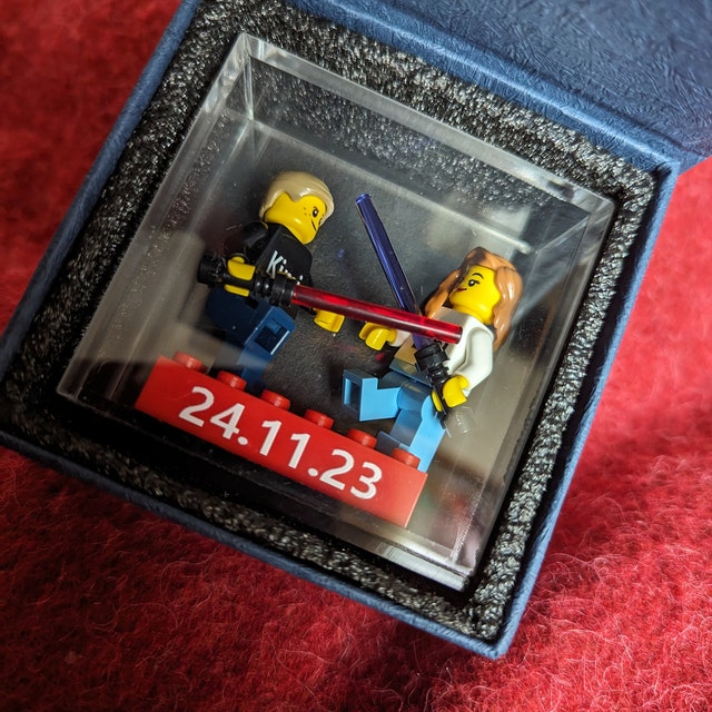 Custom Mini-figures on a Personalized Brick Made Using Up-cycled