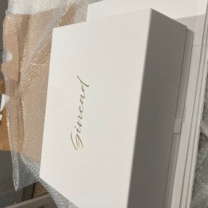 Charlotte added a photo of their purchase