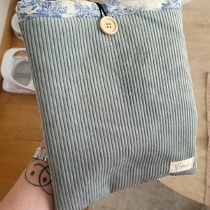 Natalia added a photo of their purchase