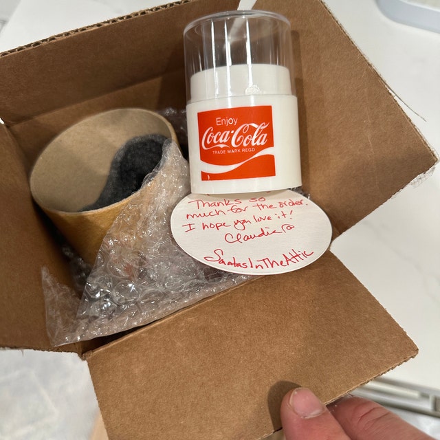 Serve up this nifty Coca Cola toothpick dispenser at your next dinner –