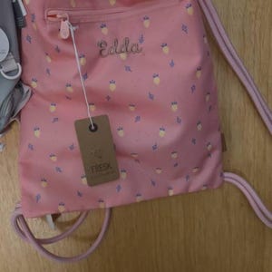 Janine added a photo of their purchase