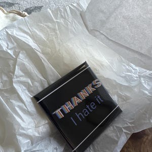 Aisha added a photo of their purchase