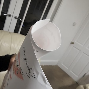 Mrs added a photo of their purchase