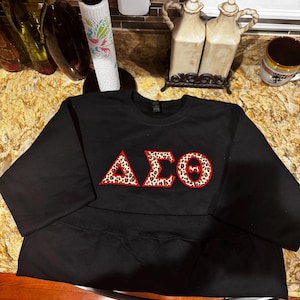 Khaliah added a photo of their purchase