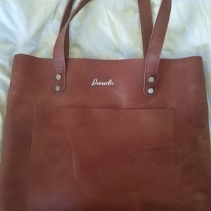 Daniela added a photo of their purchase