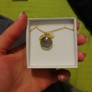 Tatiana added a photo of their purchase