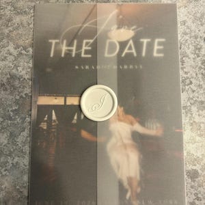 Sarah added a photo of their purchase