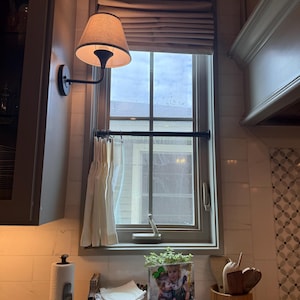 Maggie added a photo of their purchase