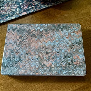 Corrie added a photo of their purchase