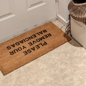 take off your balenciaga's doormat