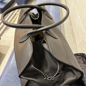 Kathryn added a photo of their purchase