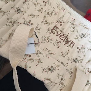 Ashley added a photo of their purchase
