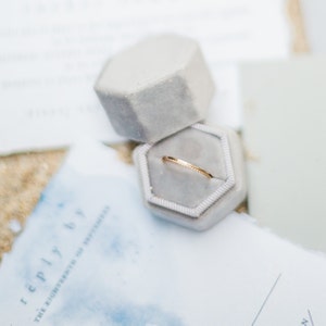 Liz Romeka added a photo of their purchase