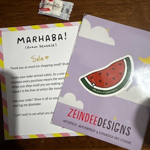 Sela added a photo of their purchase