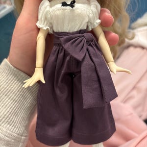 Karlie added a photo of their purchase