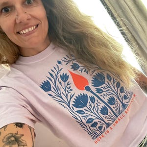 Laura added a photo of their purchase