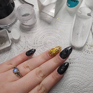Black added a photo of their purchase