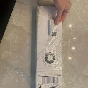 Taylor added a photo of their purchase