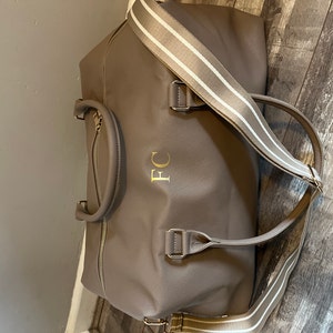 Francesca added a photo of their purchase