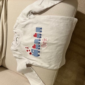 Sarah added a photo of their purchase