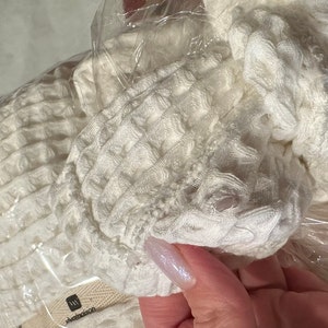 Laura added a photo of their purchase