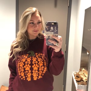 Liz added a photo of their purchase