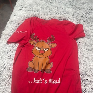 Sabine added a photo of their purchase