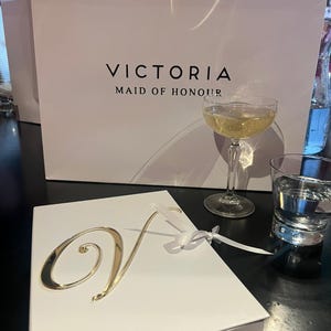 Nicola added a photo of their purchase