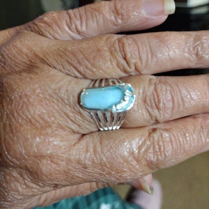 Sharon added a photo of their purchase