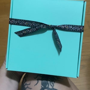 Gabby added a photo of their purchase