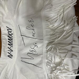 Natalie added a photo of their purchase