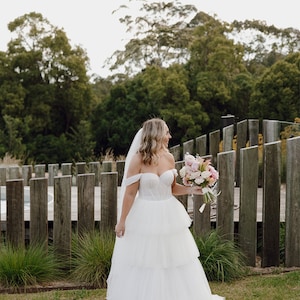 Leigh added a photo of their purchase