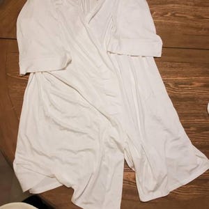 Carolyn added a photo of their purchase