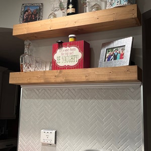 Stacey added a photo of their purchase