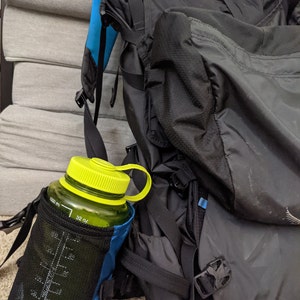 attaching water bottle to backpack