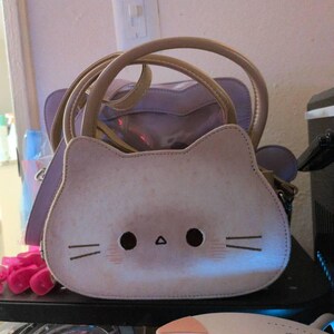 Astrid added a photo of their purchase