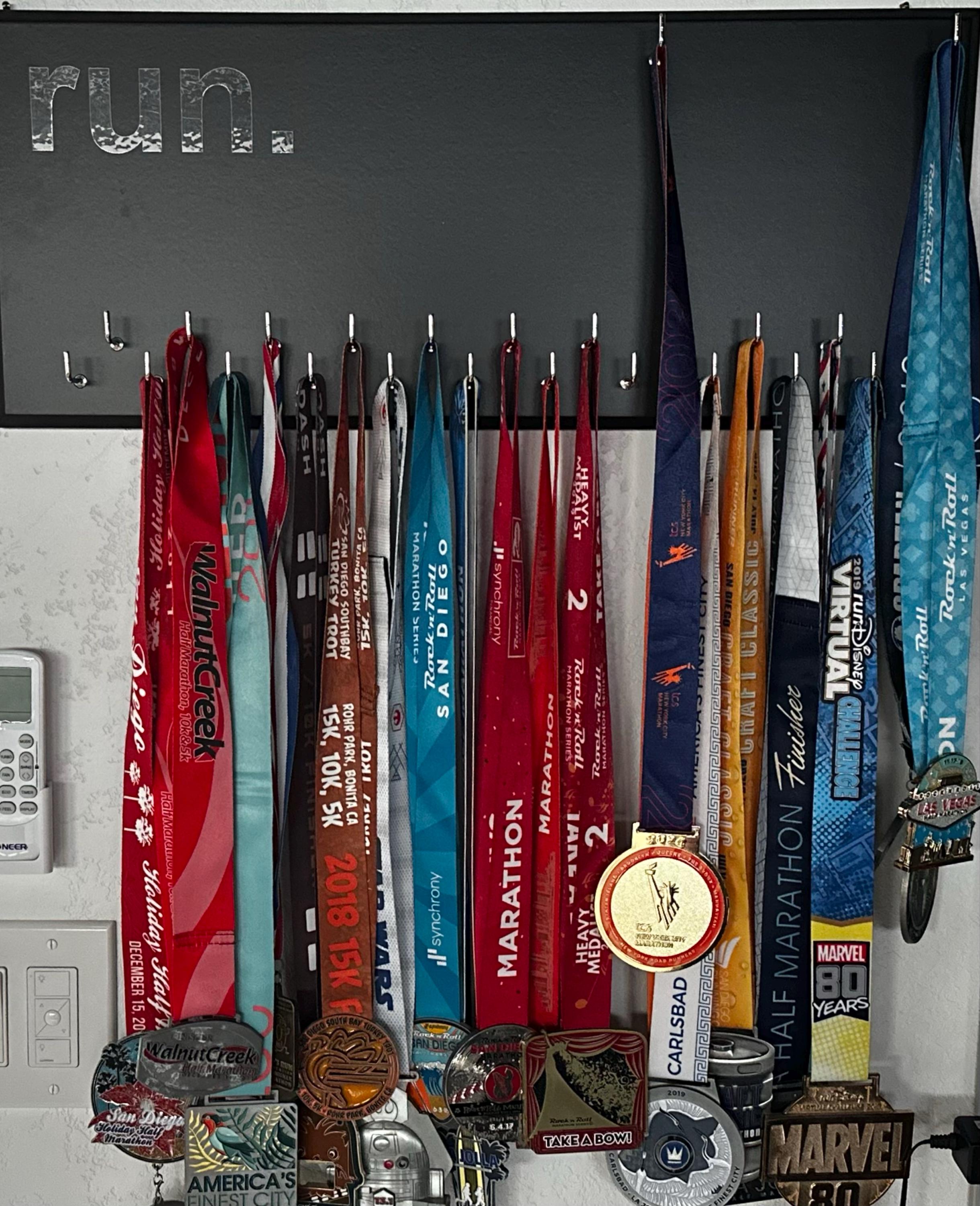 Running Medal Holder, gray or black with chrome "run." vinyl, 21 hooks and BIB holder