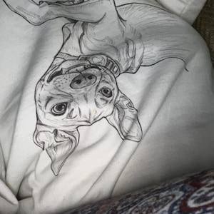 Alexandra added a photo of their purchase
