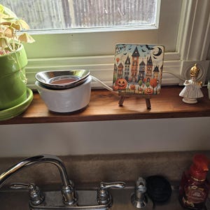 Joanna added a photo of their purchase