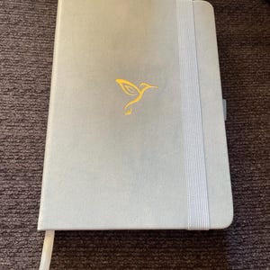 Sarah added a photo of their purchase