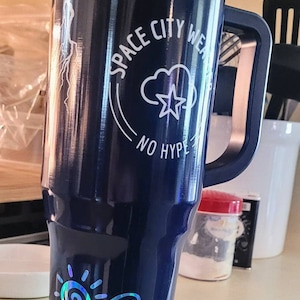Sarah added a photo of their purchase
