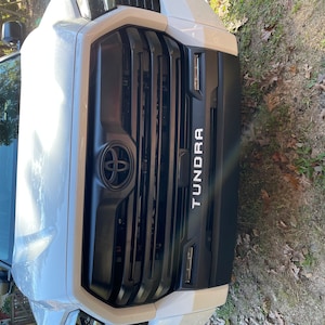 Kayla added a photo of their purchase