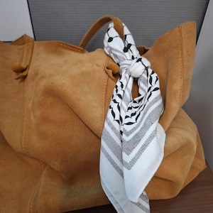 Alin added a photo of their purchase